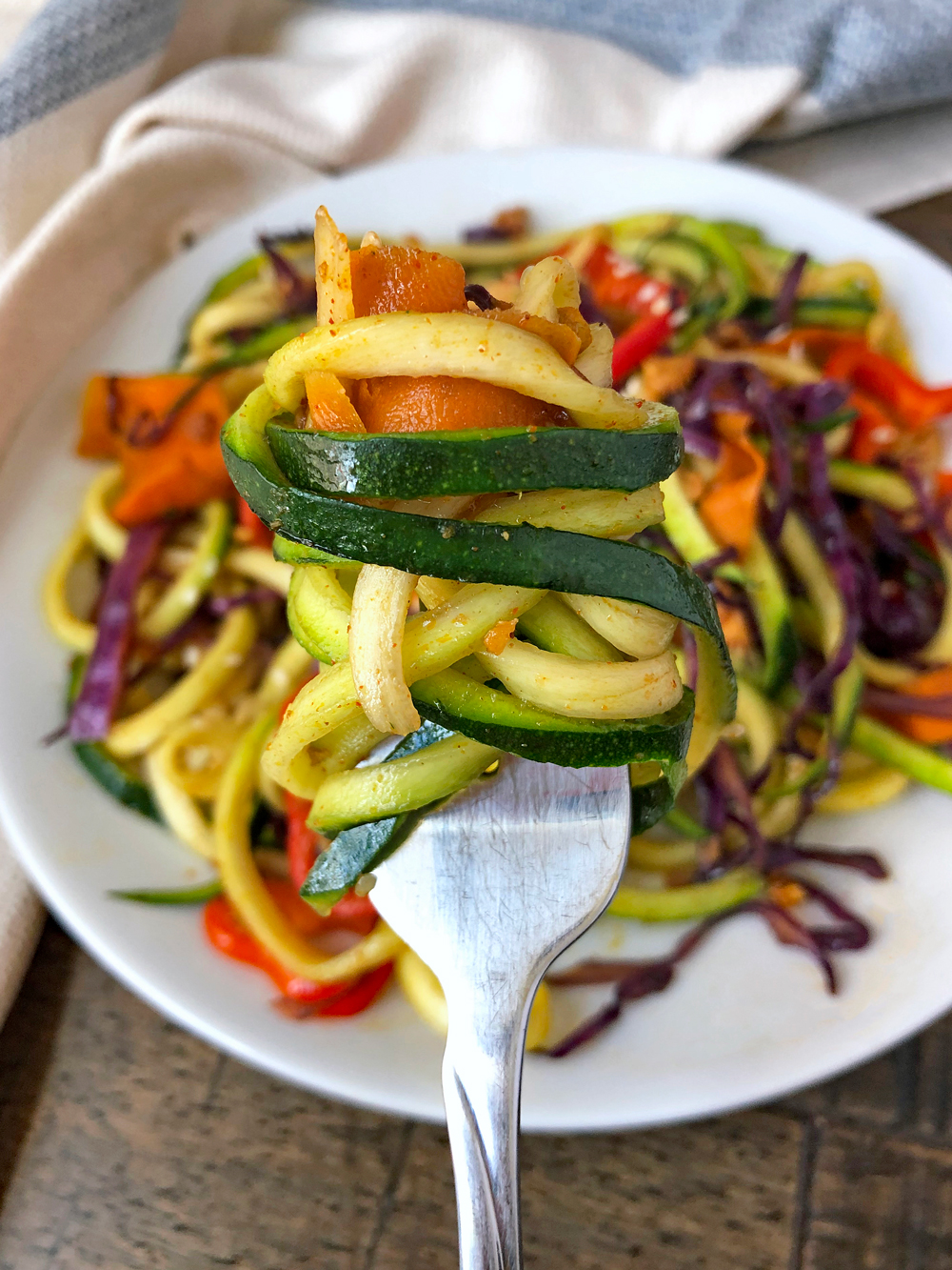 A bite of zucchini noodles