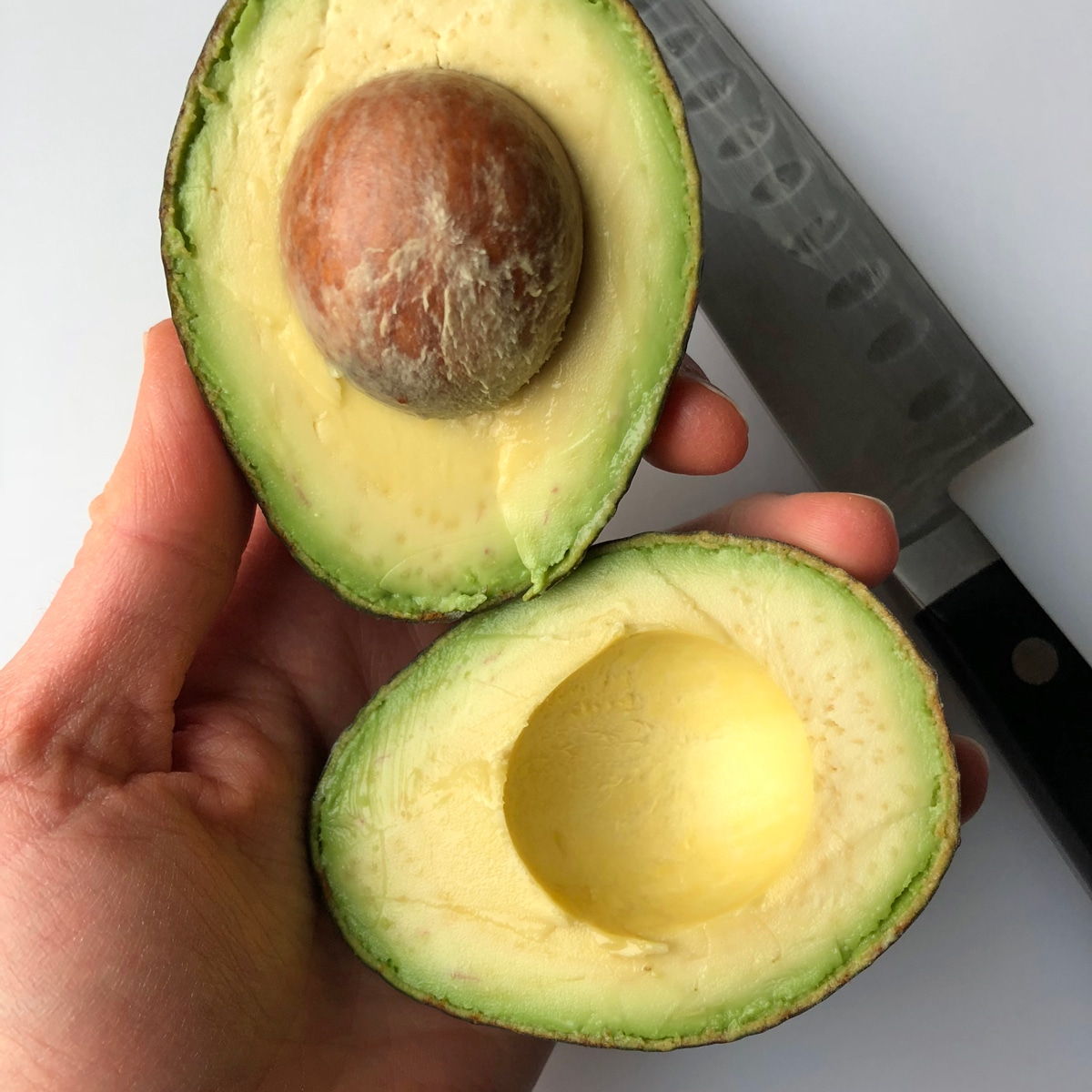 step two - cut avocado in half