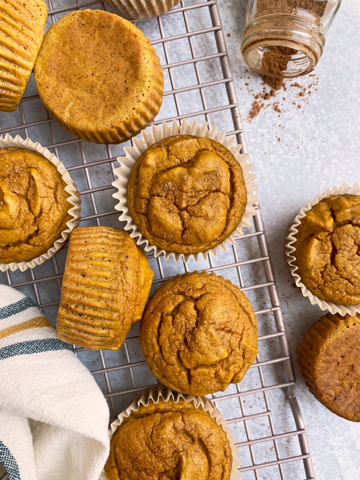 pumpkin protein muffins on wire cooling rack