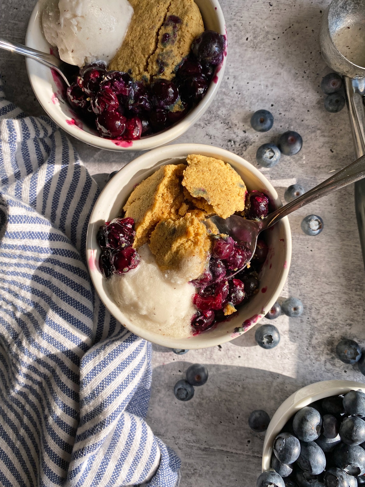 top view of blueberry cobbler with vanilla ice cream