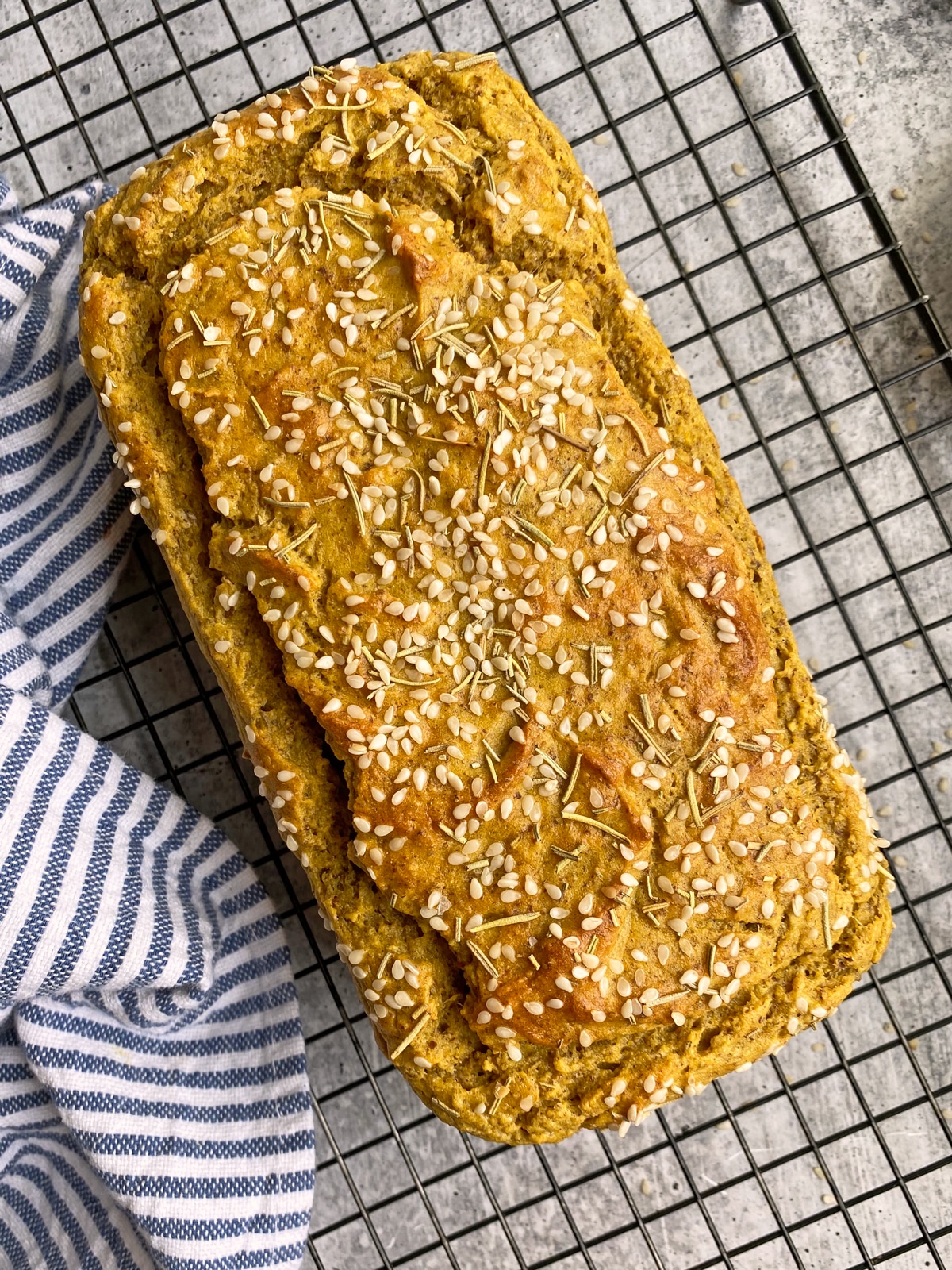 fresh baked loaf on wire cooling rack