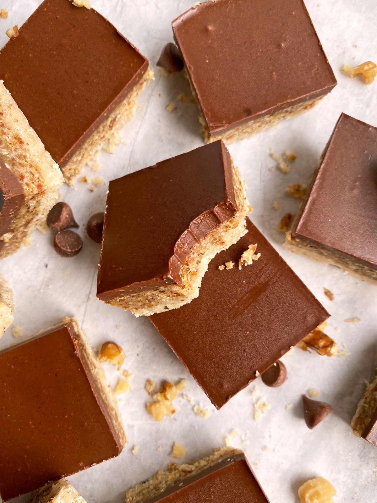 walnut bars on parchment paper