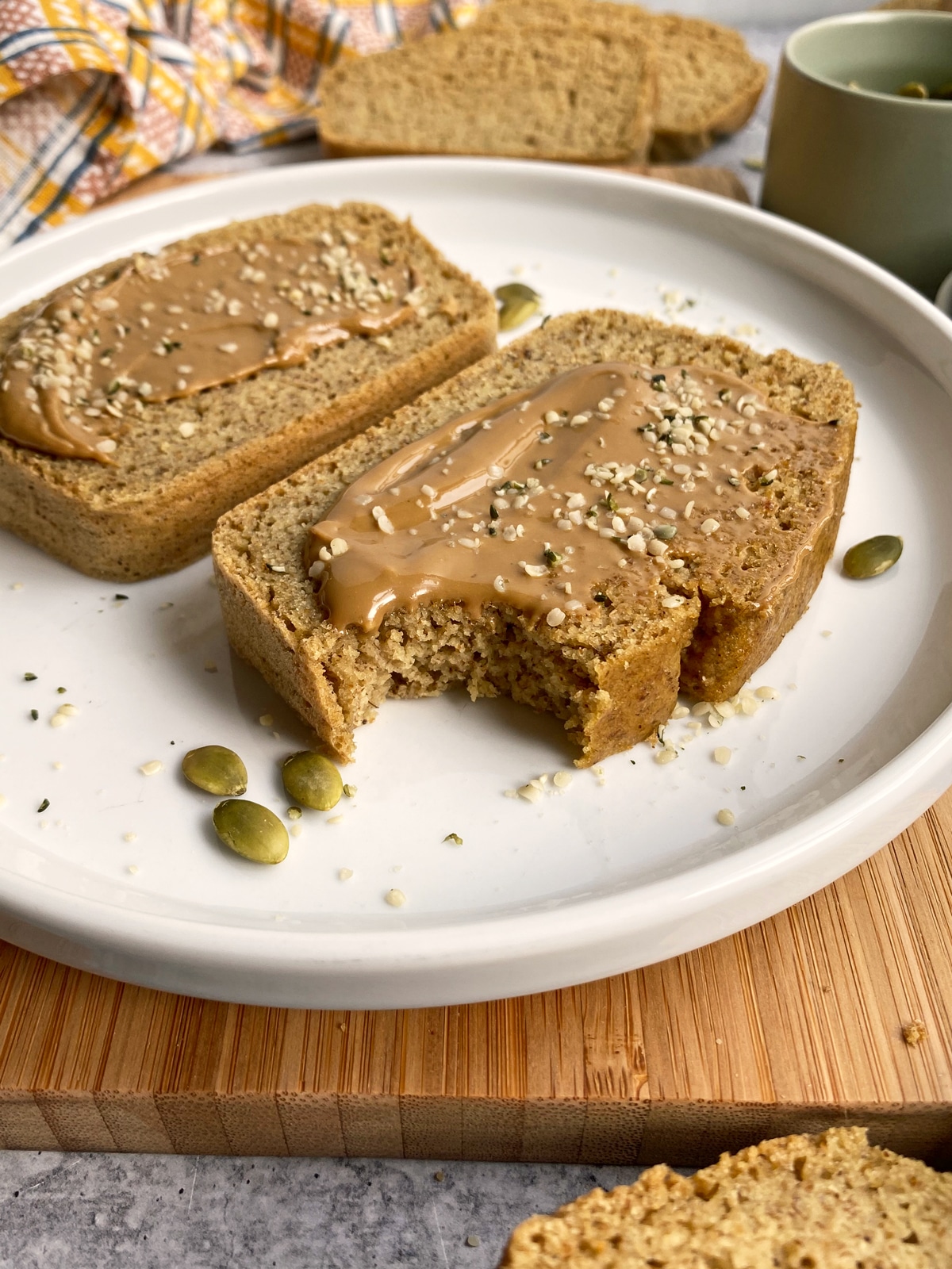 tigernut bread topped with SunButter and hemp seeds