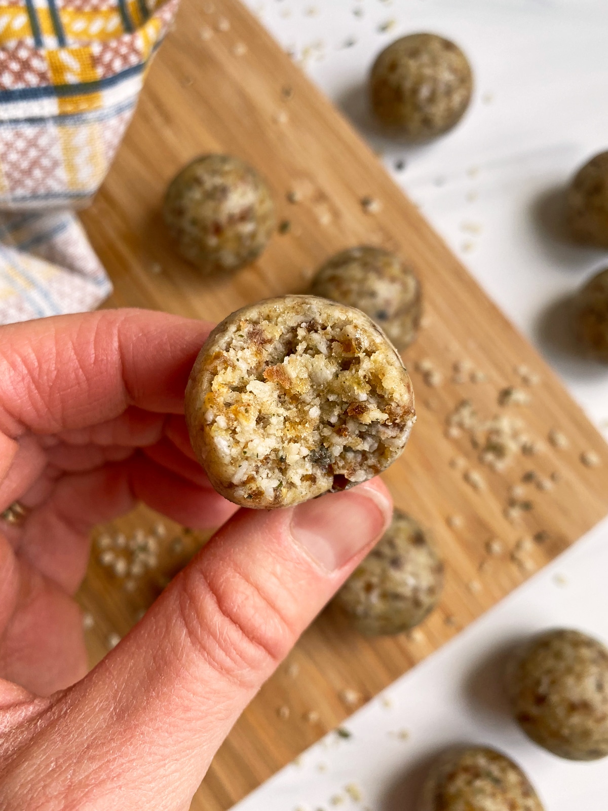 holding a hemp seed ball