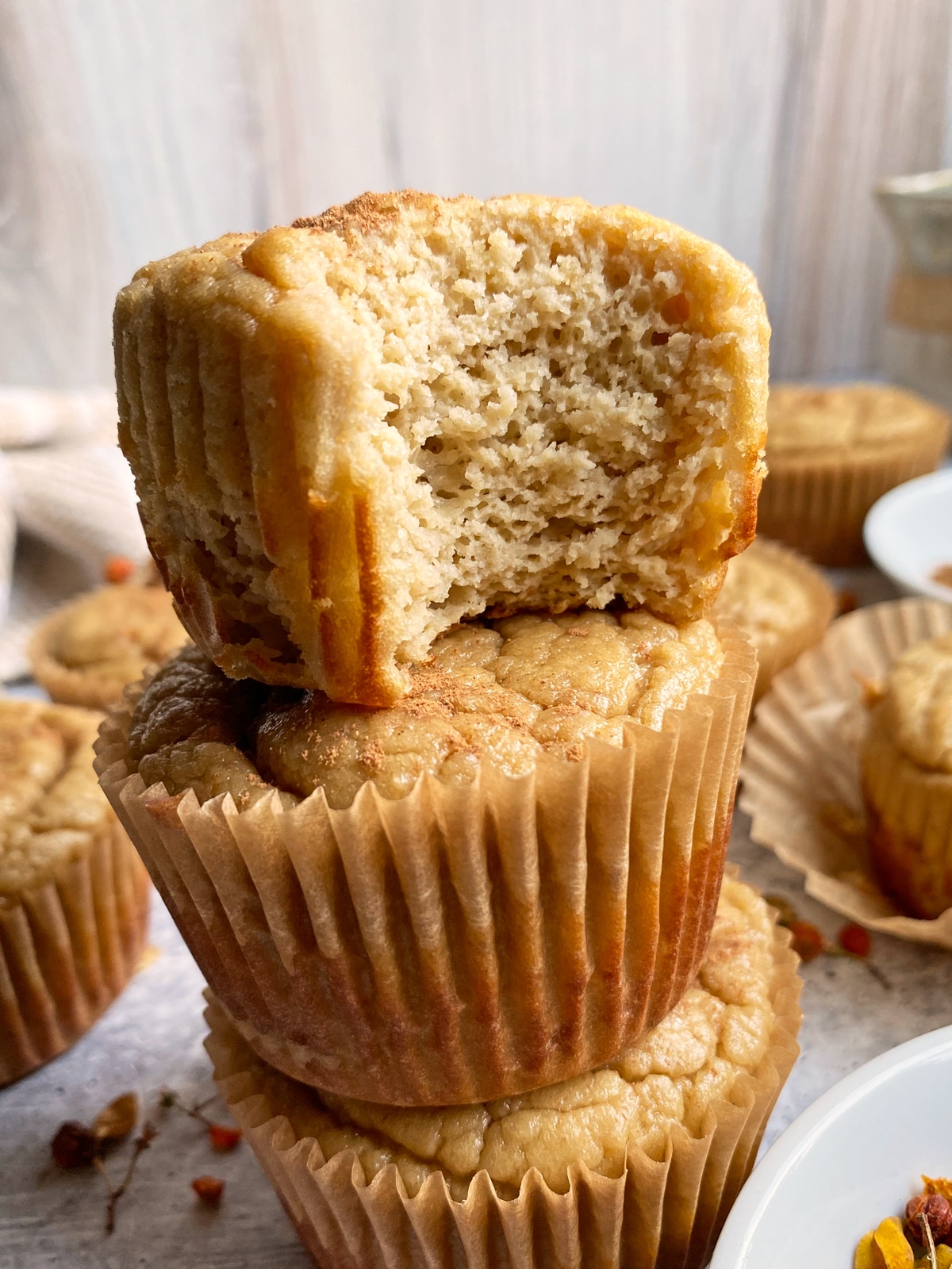 Bite of a muffin to show the inside texture.