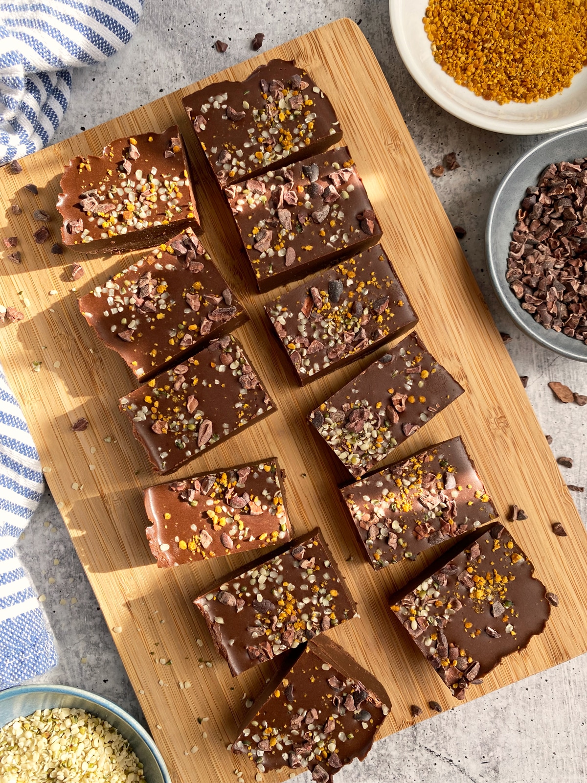 sliced bone broth protein fudge on wooden cutting board