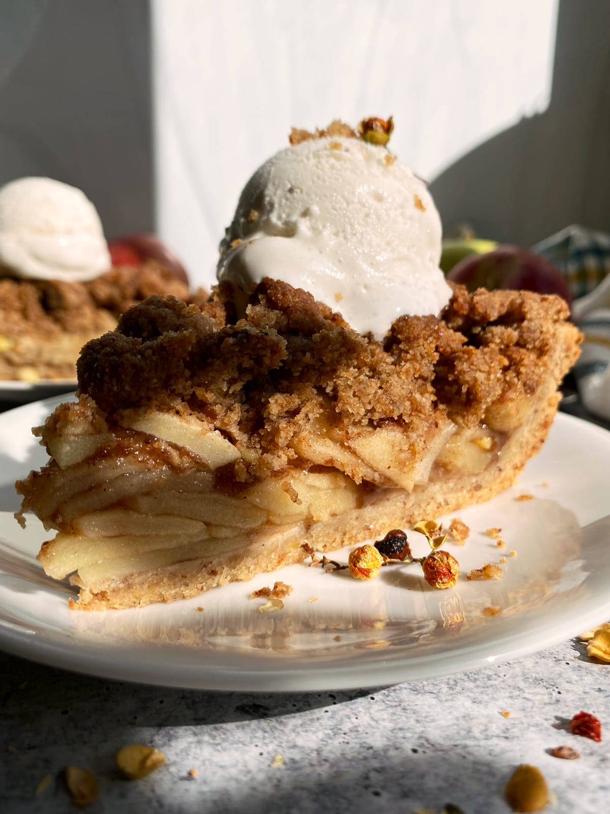 paleo apple pie topped with coconut vanilla ice cream