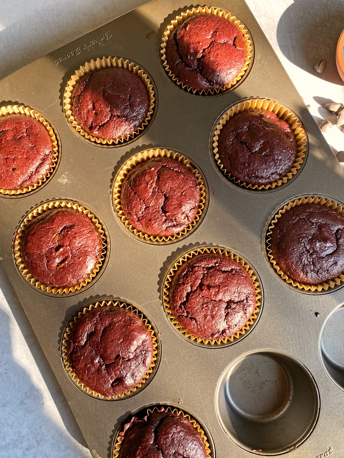 freshly baked muffins in baking pan