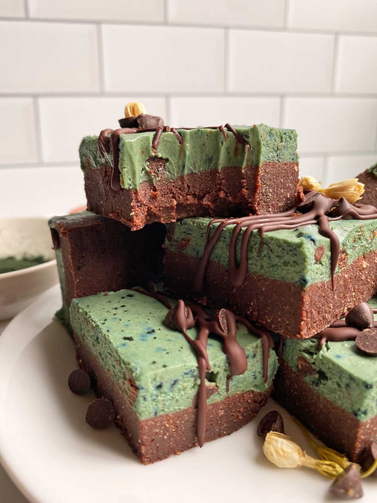 close up of a bite of a mint chocolate cookie bar