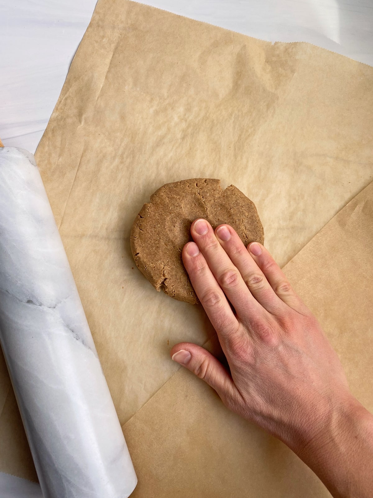 flattening-and-rolling-the-dough-for-graham-crackers