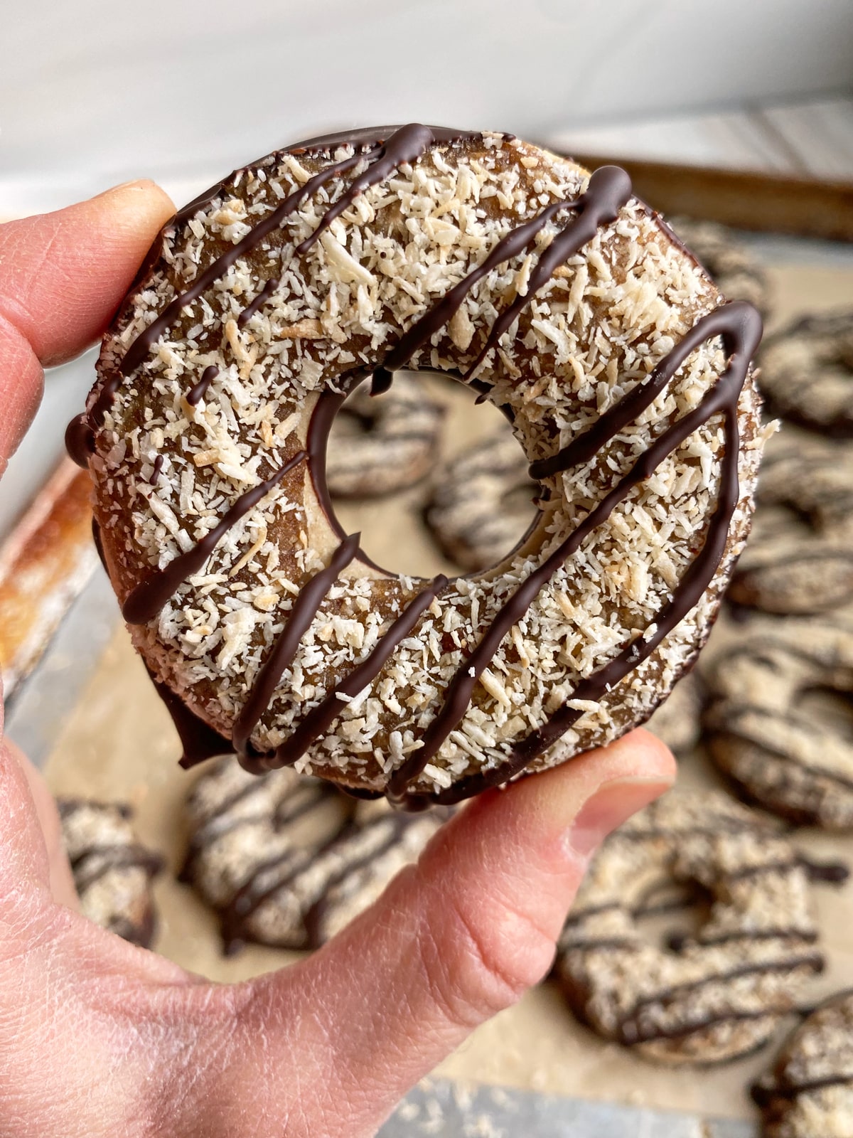 holding a healthy homemade samoa cookie