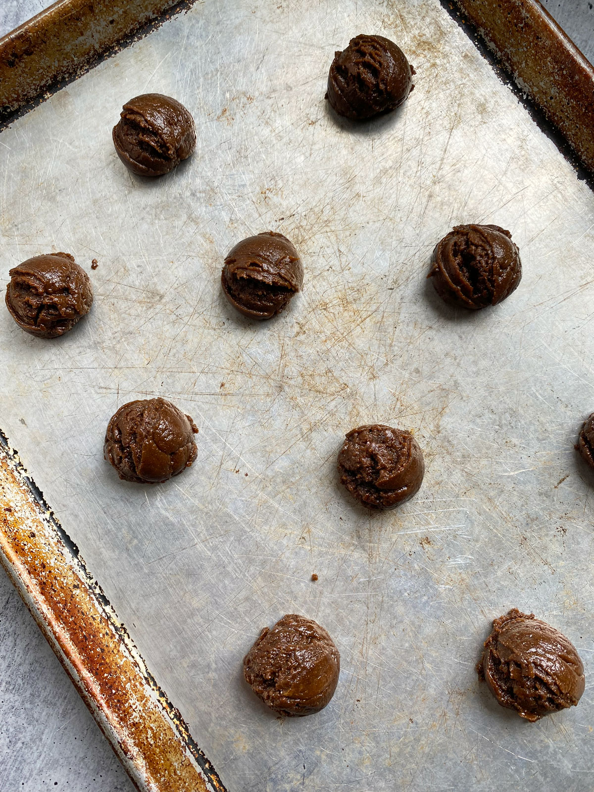 unbaked cookies on baking sheet