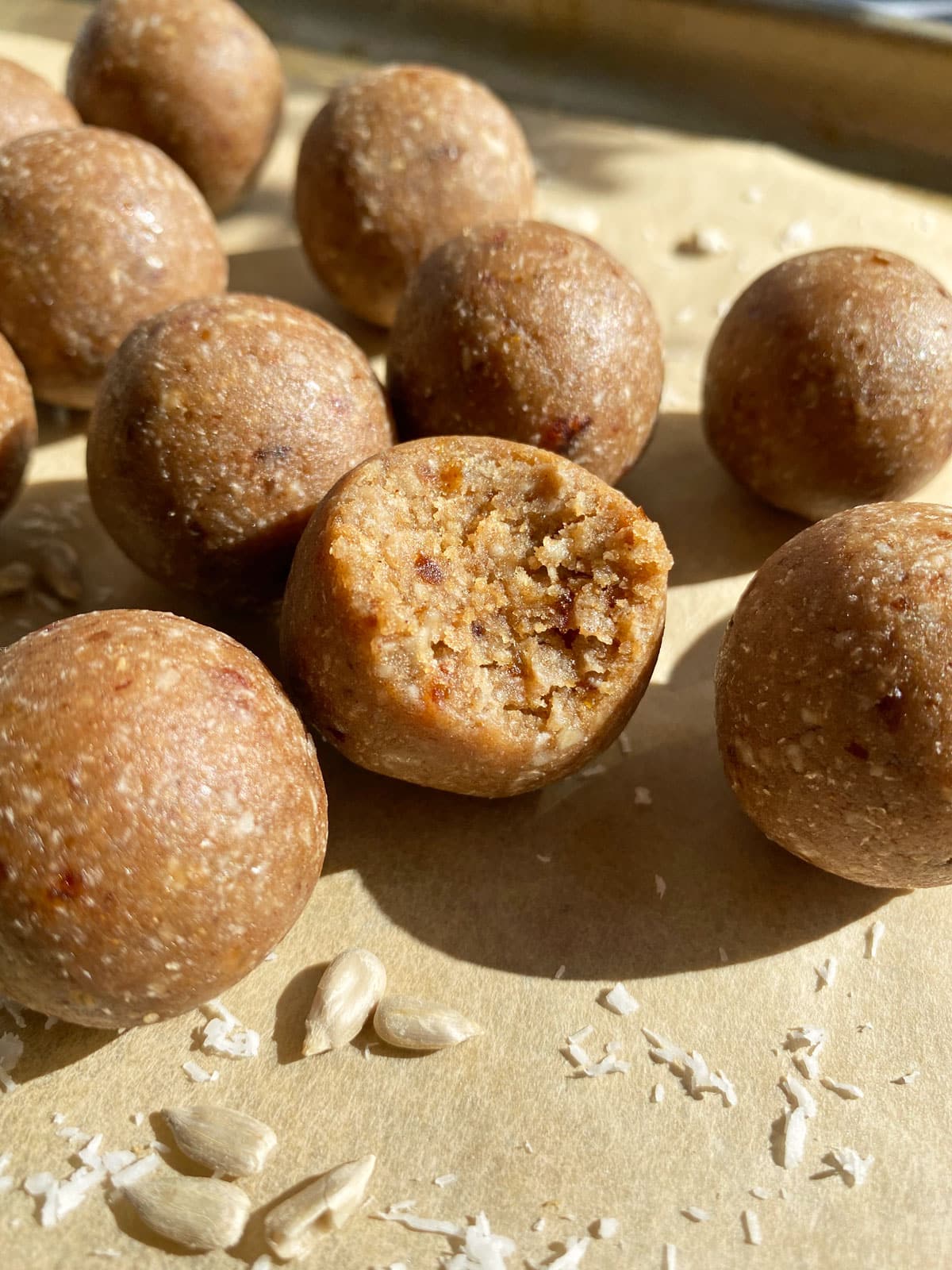 bite of a vanilla protein ball to show the inside texture