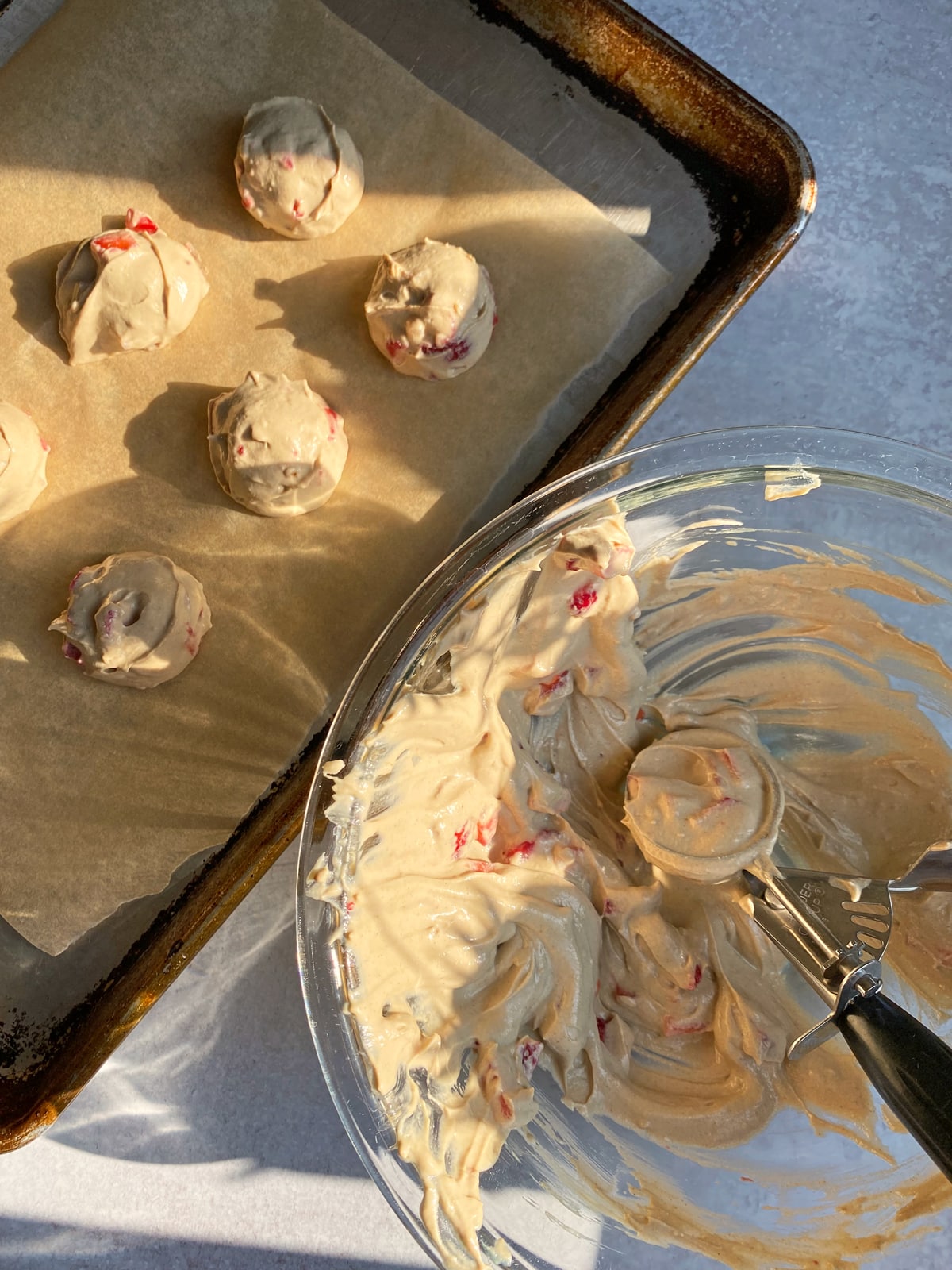 scooping the filling onto a lined baking sheet