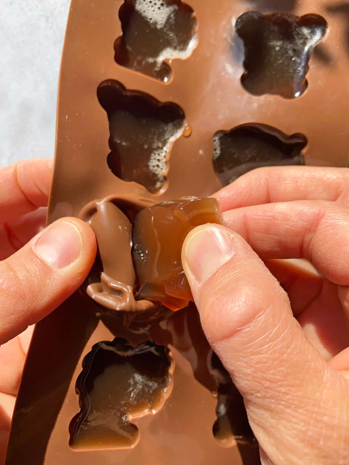 taking the gummies out of the silicone mold