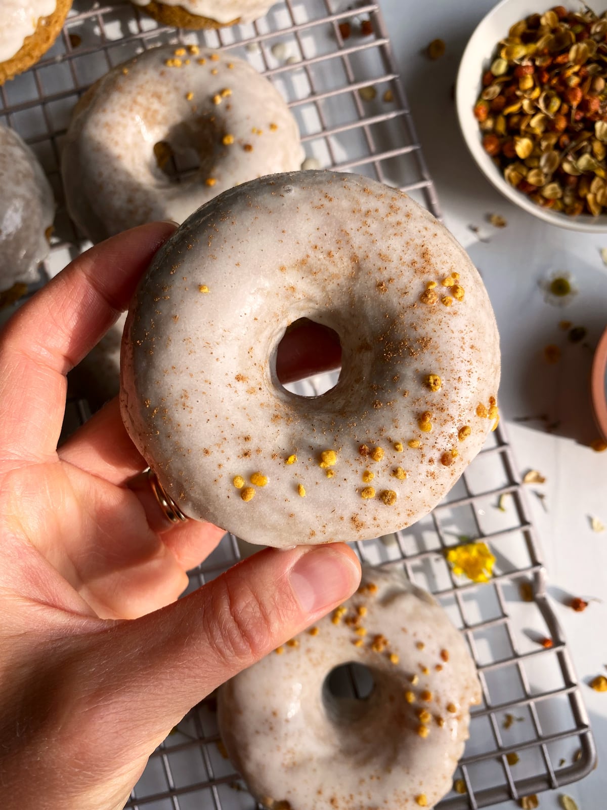 Holding a butternut squash donut.