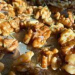 Close up of savory roasted walnuts.