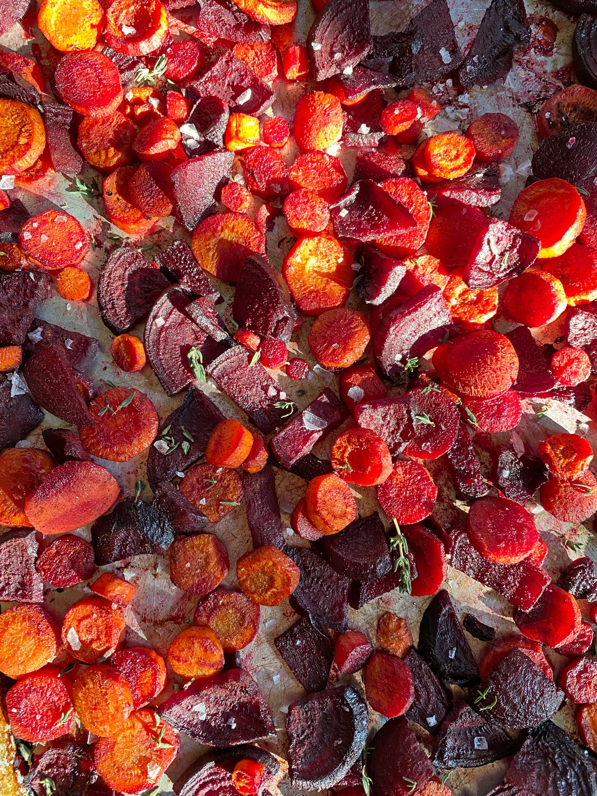 Baked veggies on baking pan.