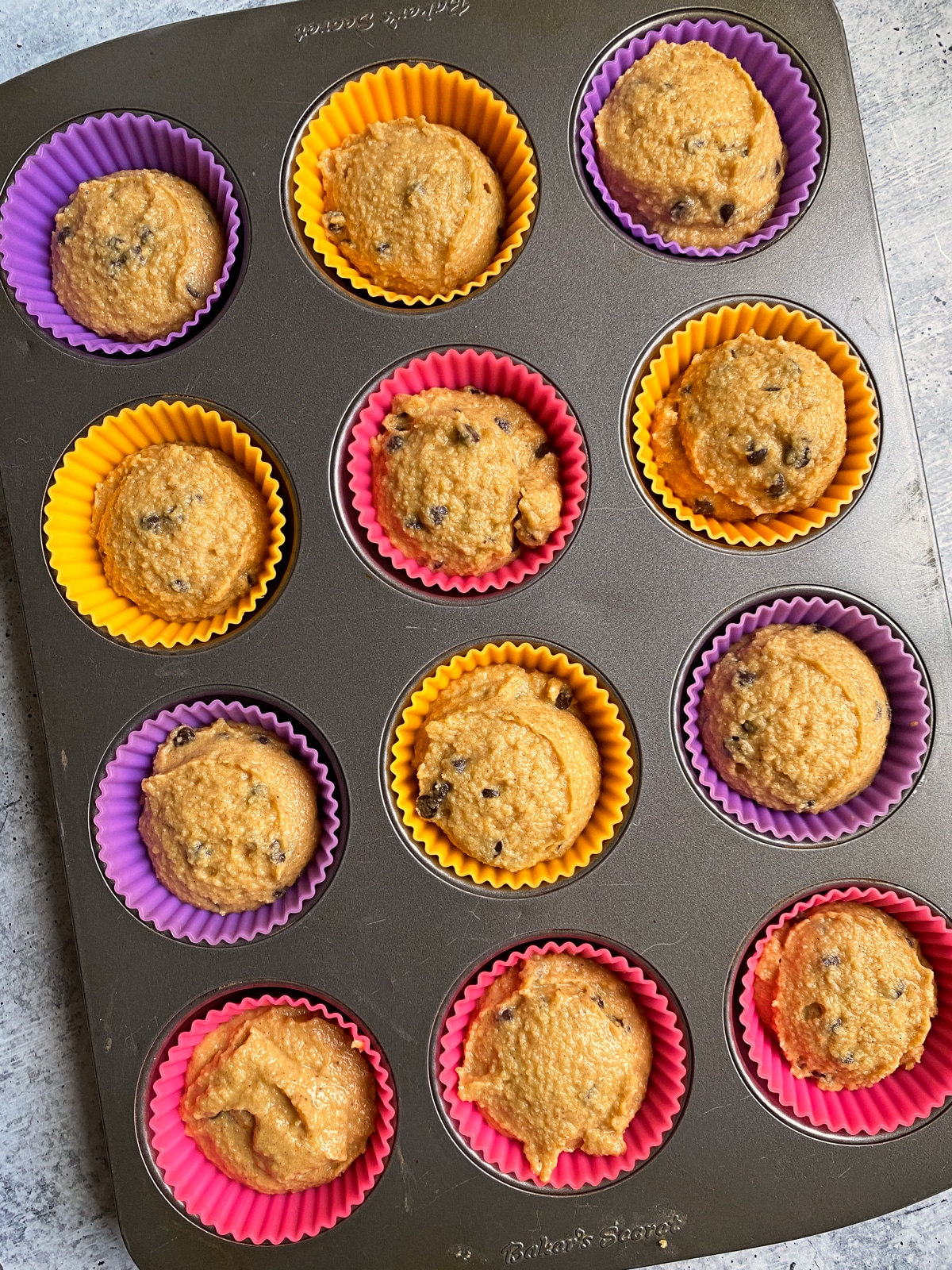 Pumpkin chocolate chip muffins ready to be baked.