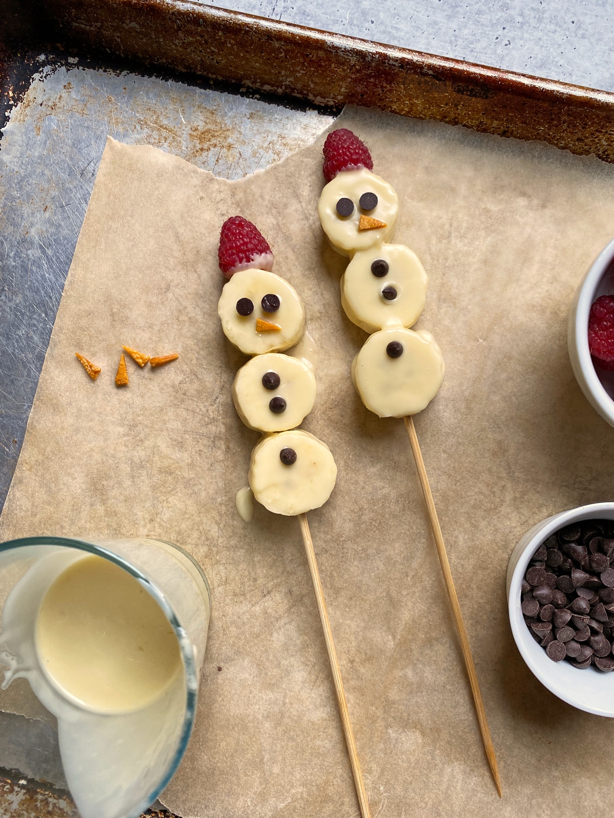 Freshly dipped banana snowmen.