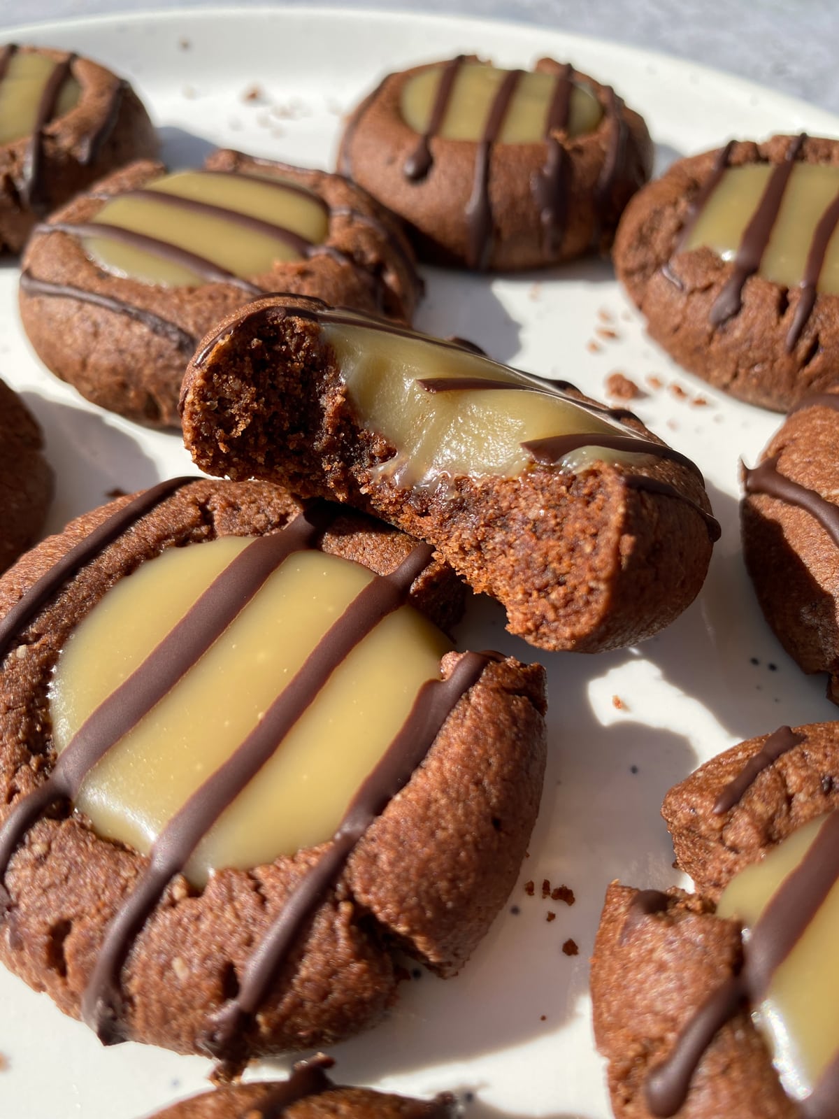 Bit of a chocolate caramel thumbprint cookie to show the inside texture.