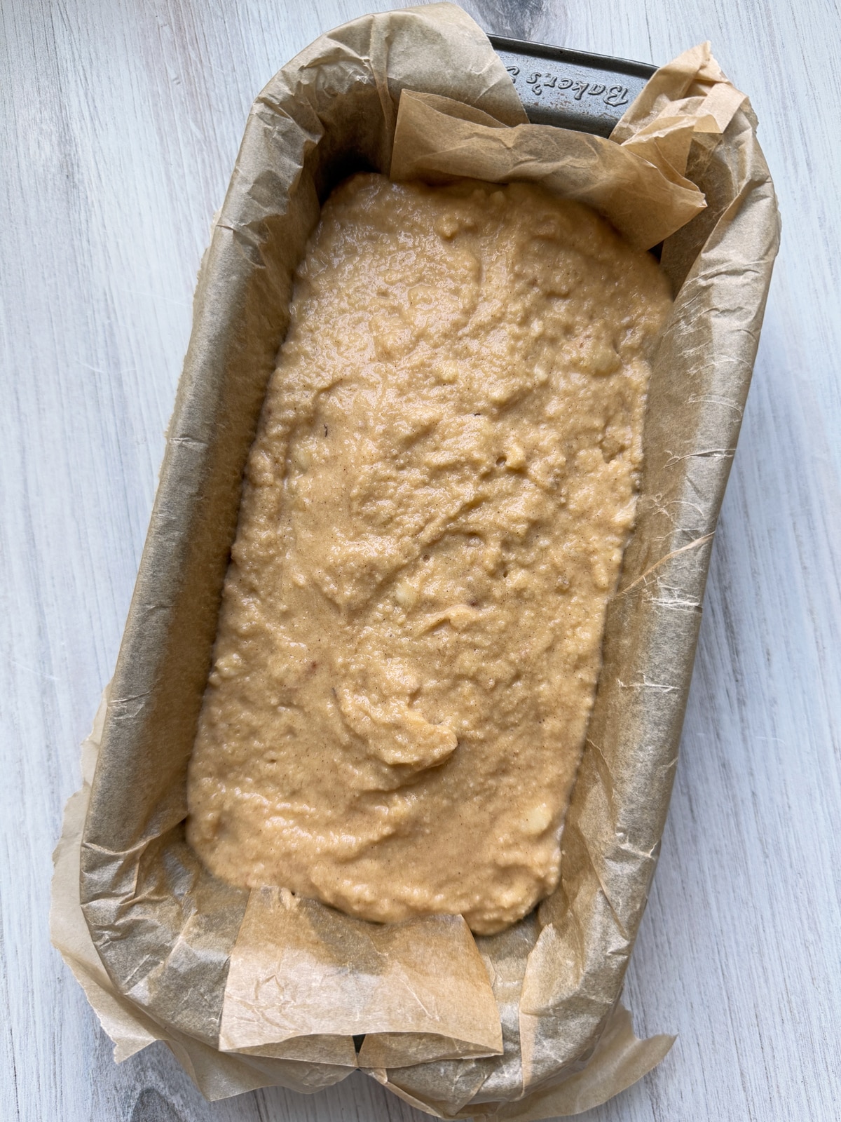 Batter in lined baking dish.