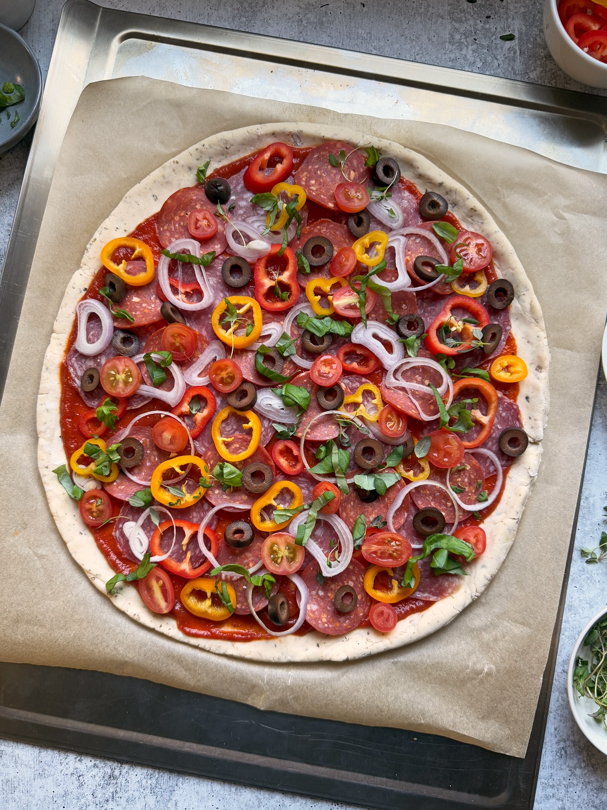 Pizza crust with toppings.