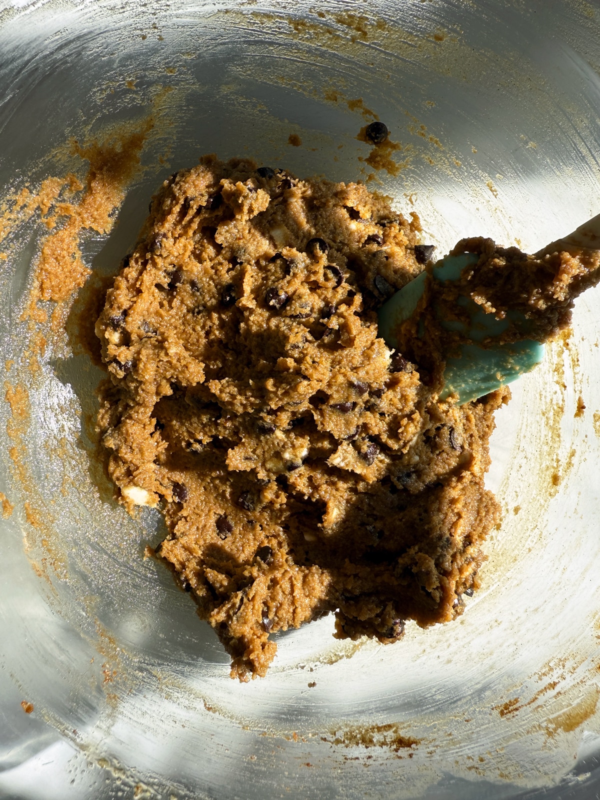 Cookie dough in mixing bowl.