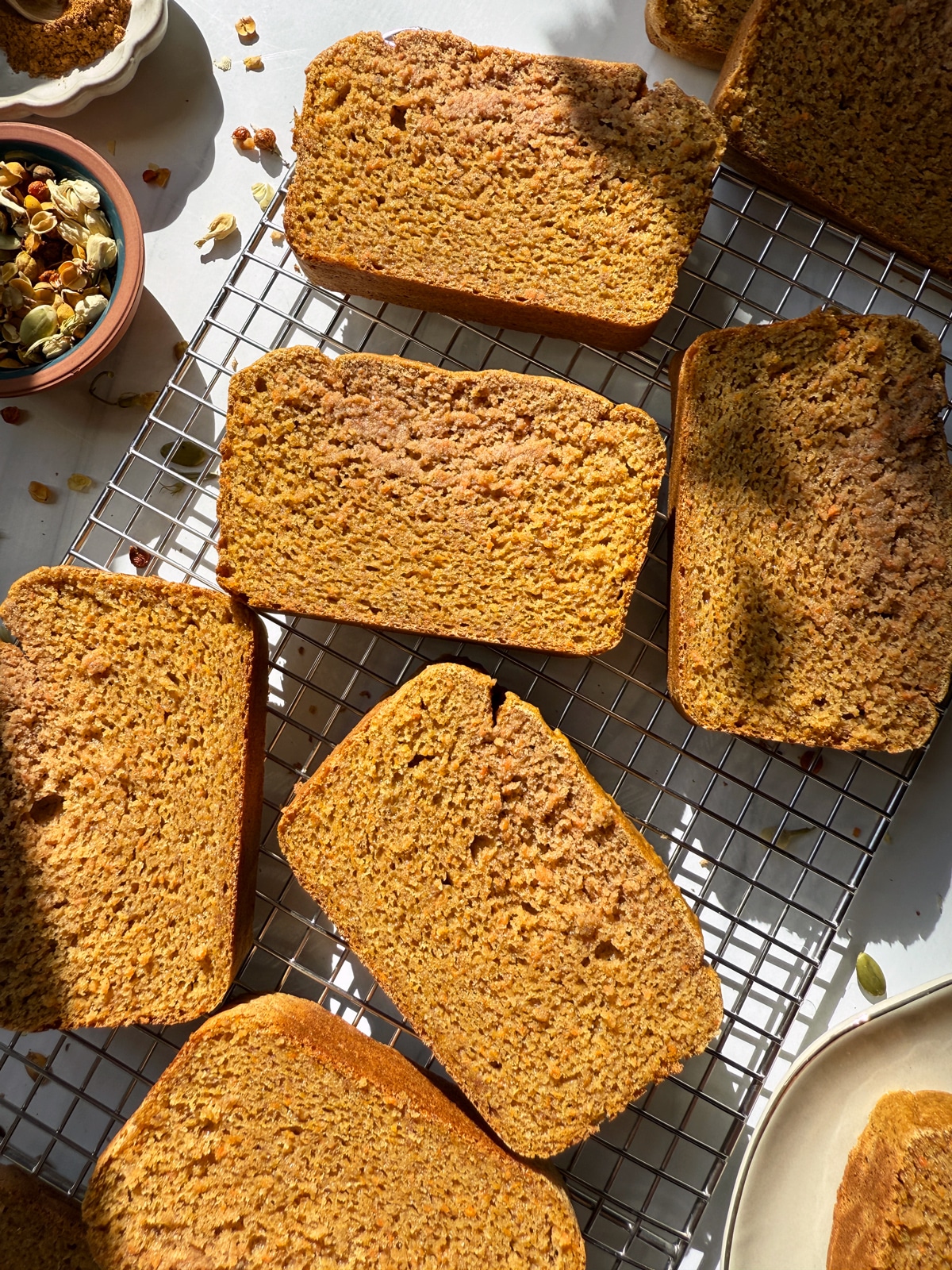 Slices of bread on wire cooling rack.
