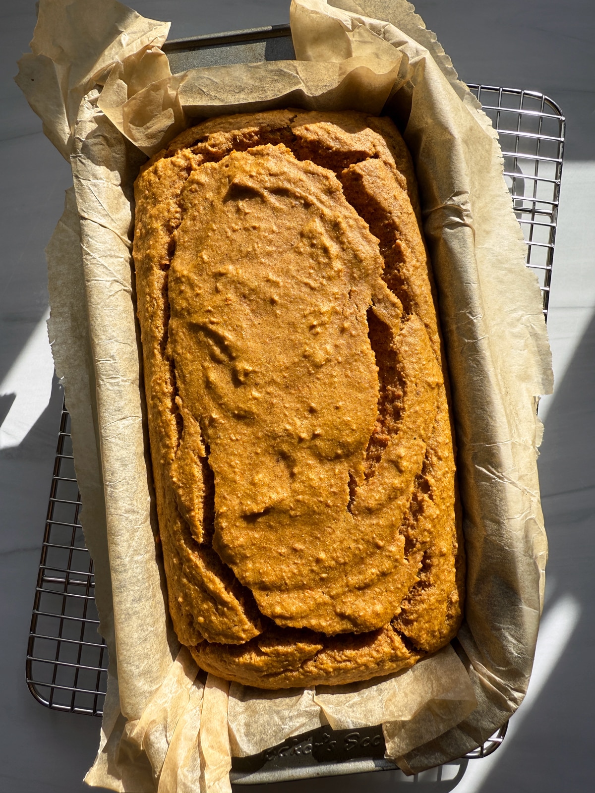Fresh baked loaf in pan.
