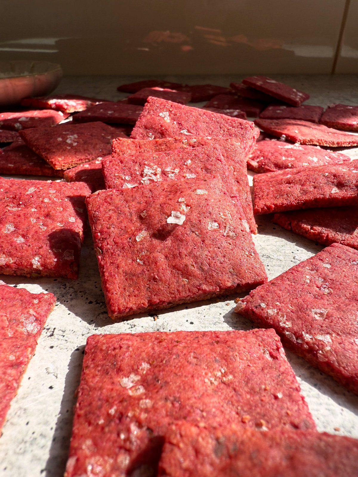 Close up of beet crackers.