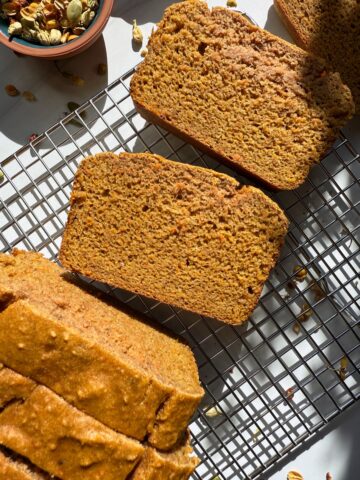 Healthy paleo carrot bread on wire cooling rack.