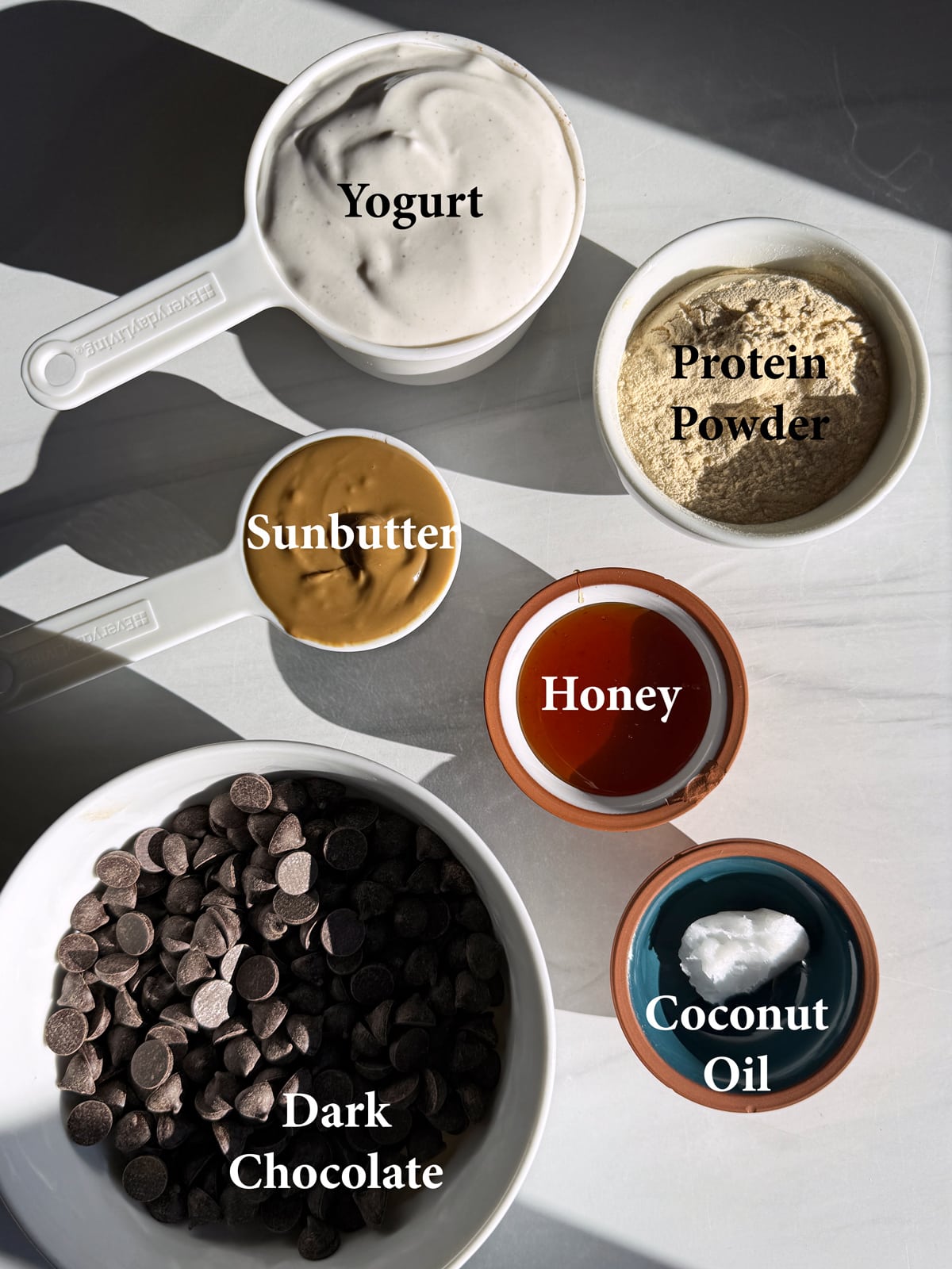 Ingredients needed to make frozen yogurt protein bars.