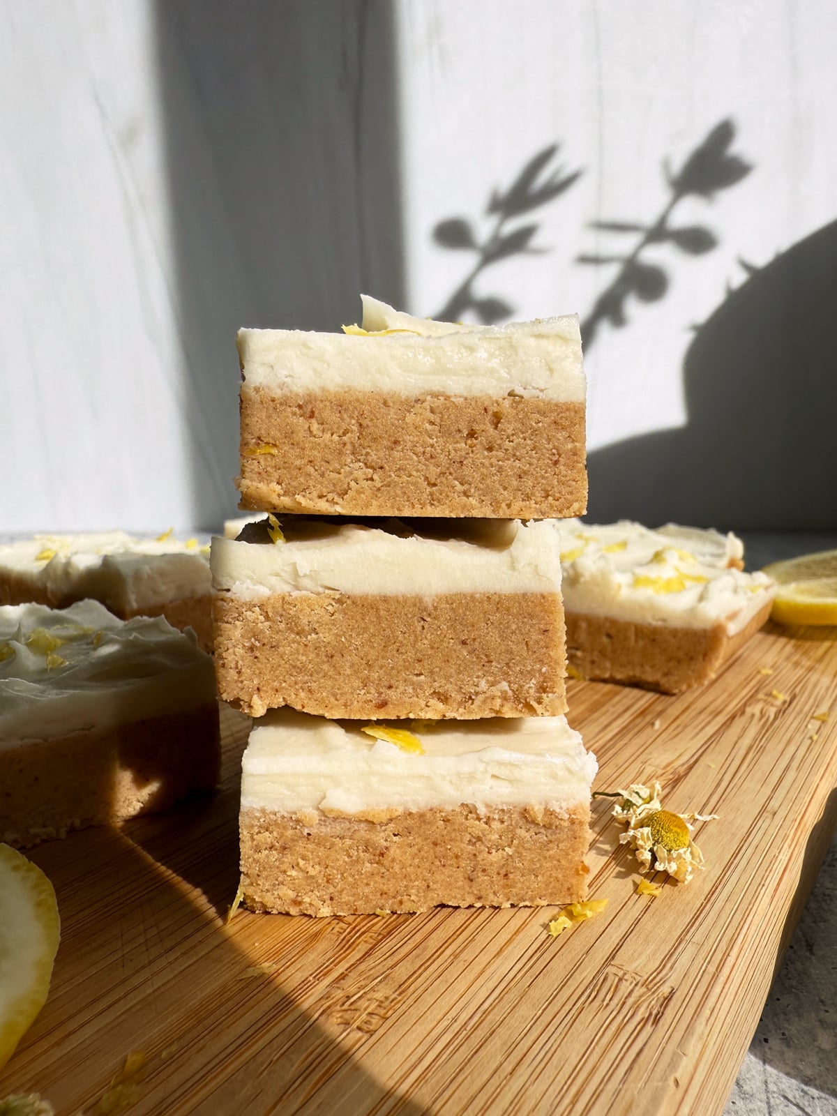 Stack of gluten free lemon cookie bars.