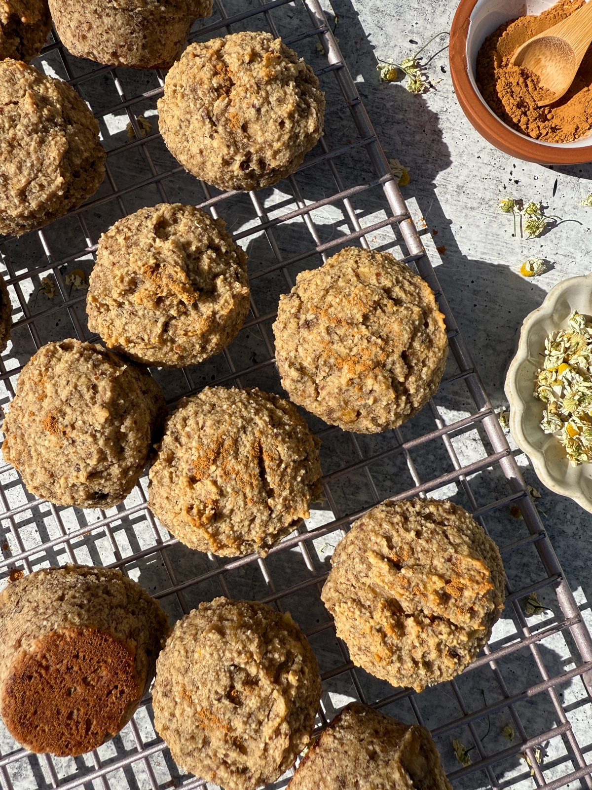 Muffins on wire cooling rack.