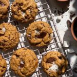 Healthy s'mores cookies on lined baking sheet.