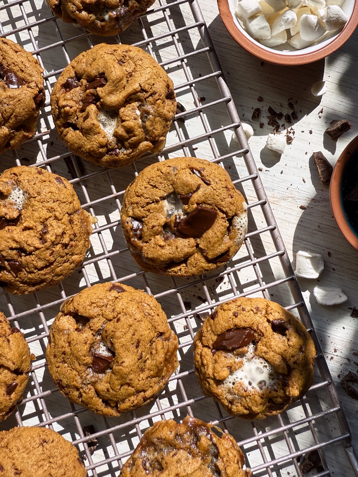 Healthy s'mores cookies on lined baking sheet.