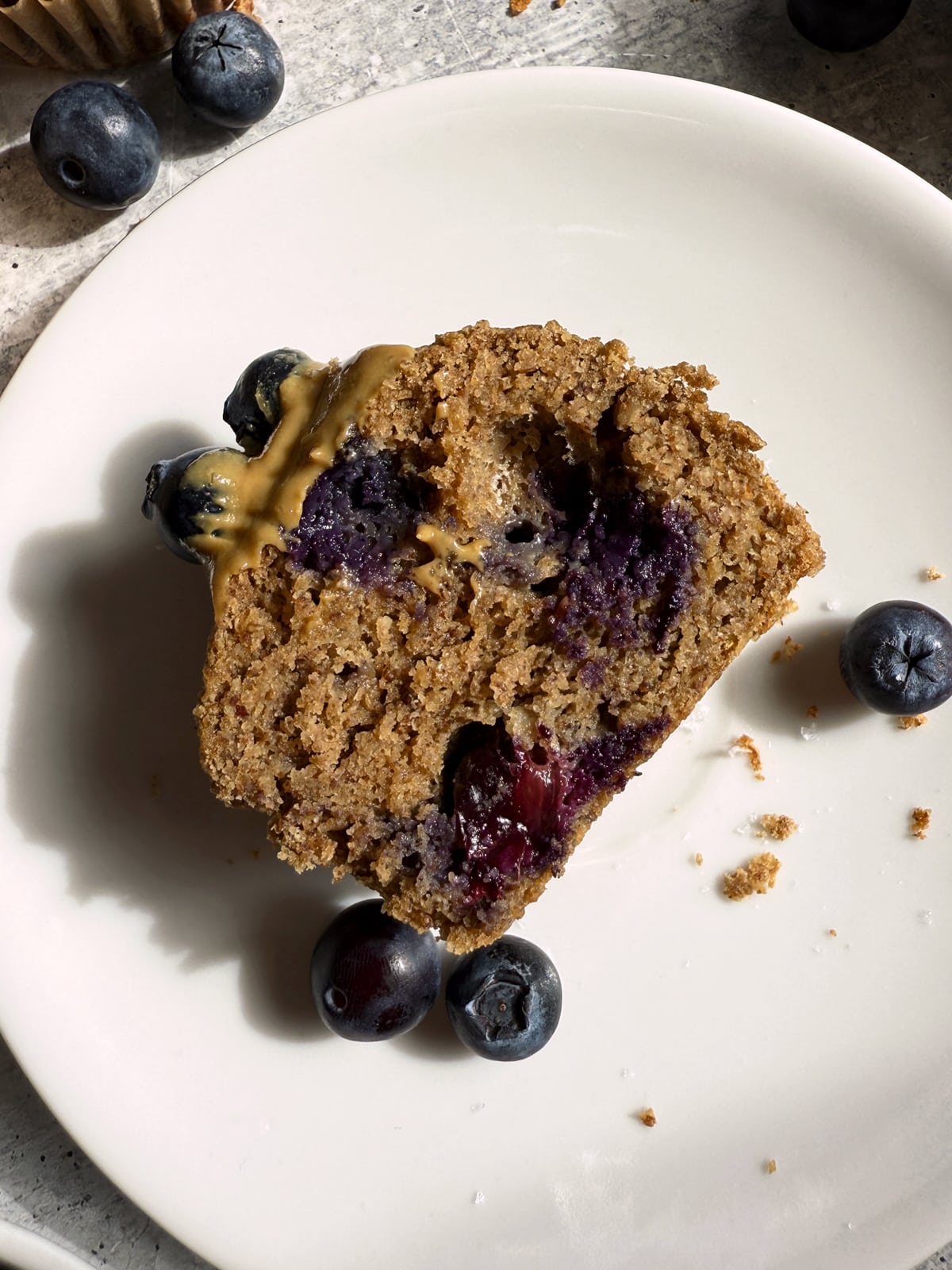 Muffin cut in half to show inside texture.