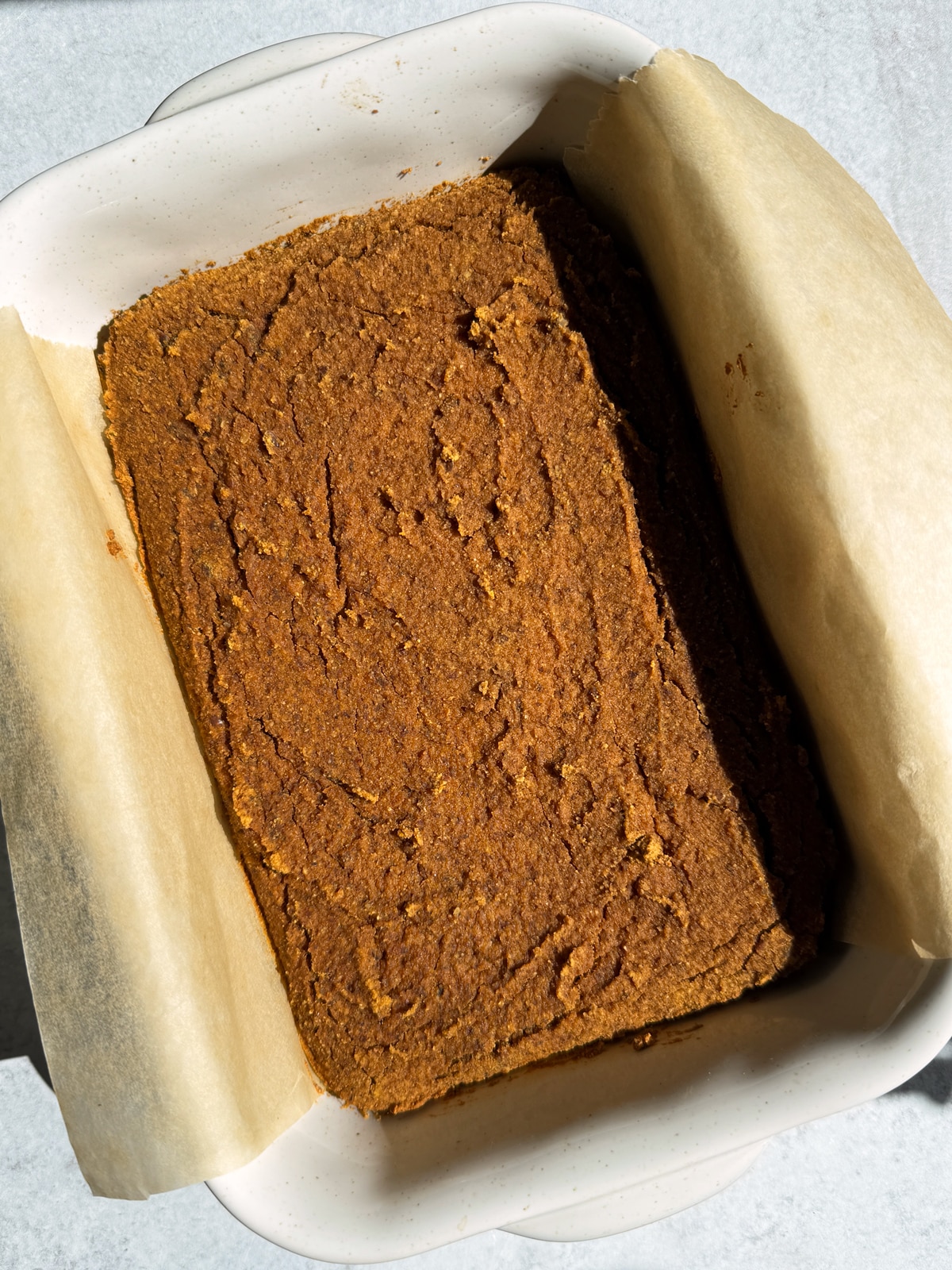 Freshly baked cake in pan.