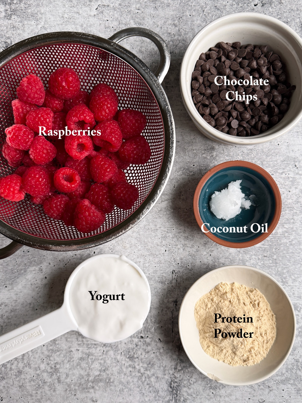 Ingredients needed to make frozen chocolate covered raspberries.