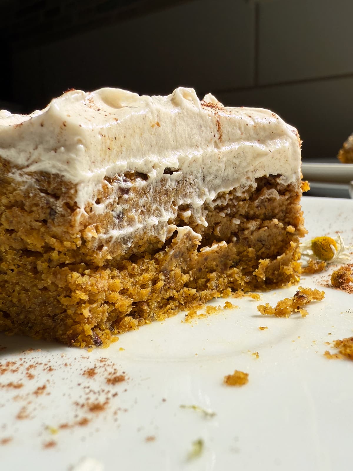 Slice of cake with a bite out of it.