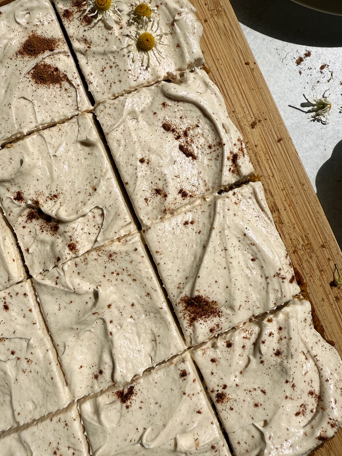 Top view of frosted and decorated cake.