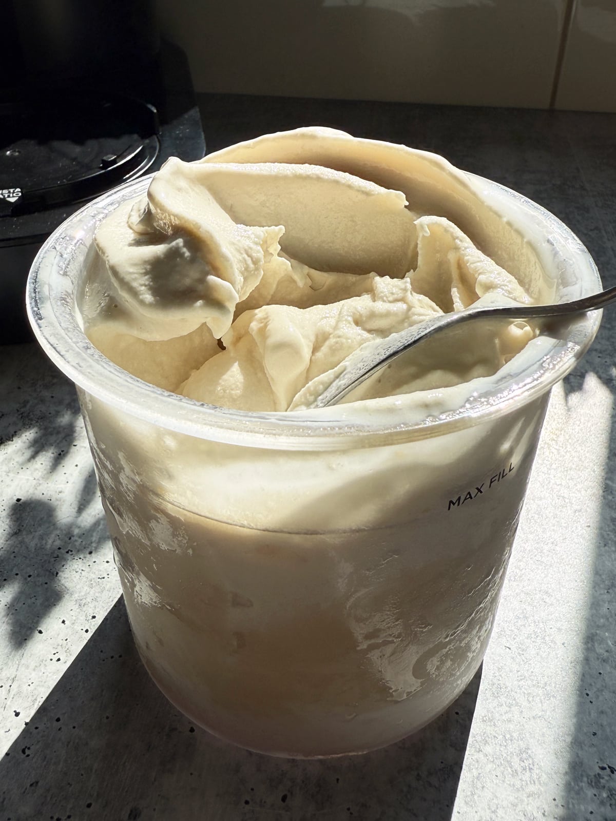 Side view of container with ice cream.