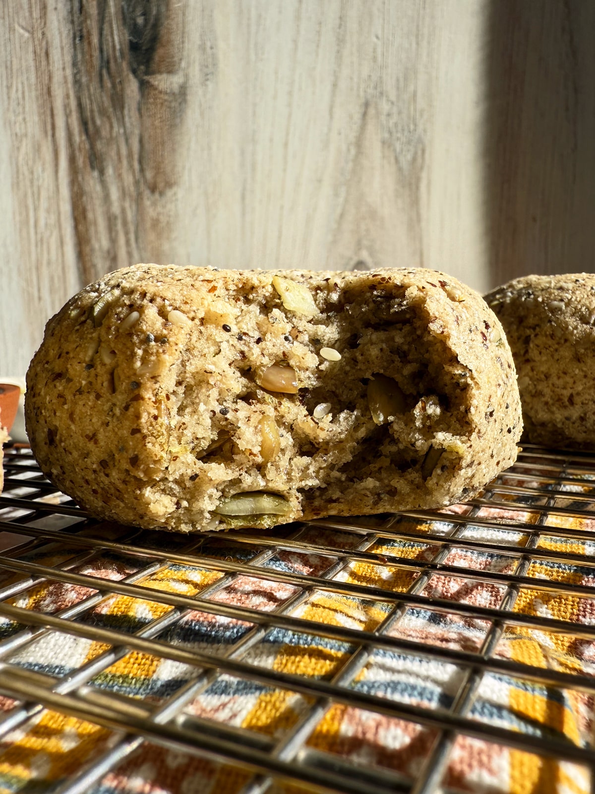 Bagel with a bite out of it to show texture.