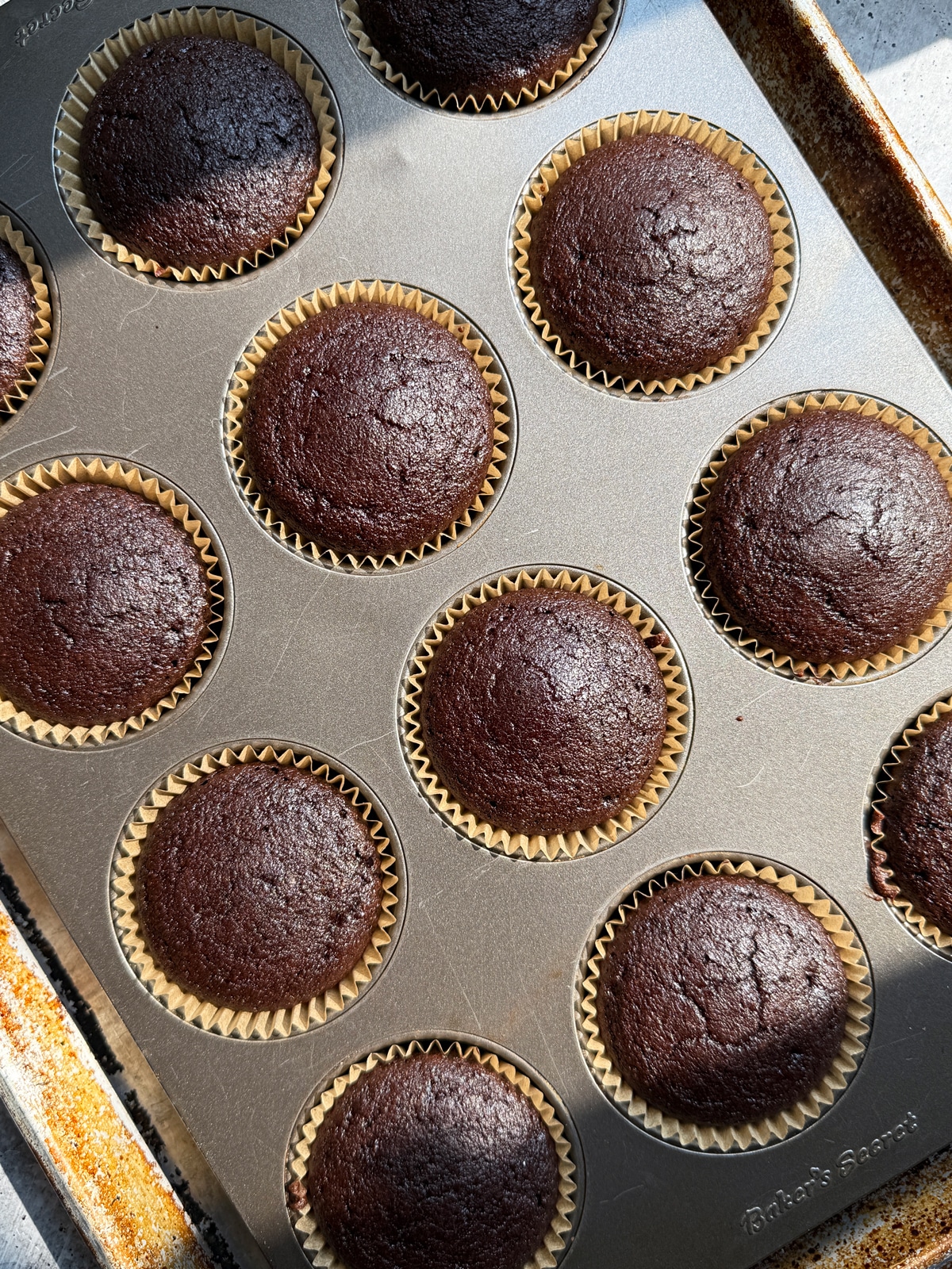 Baked cupcakes in muffin tin.