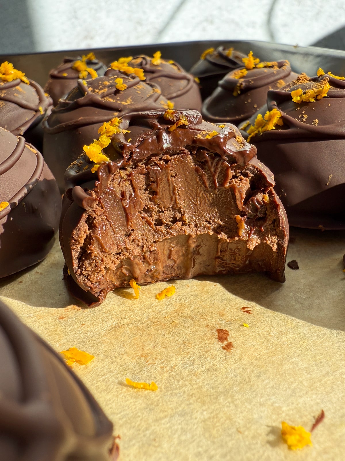 Bite of a truffle to show the fudgy texture.