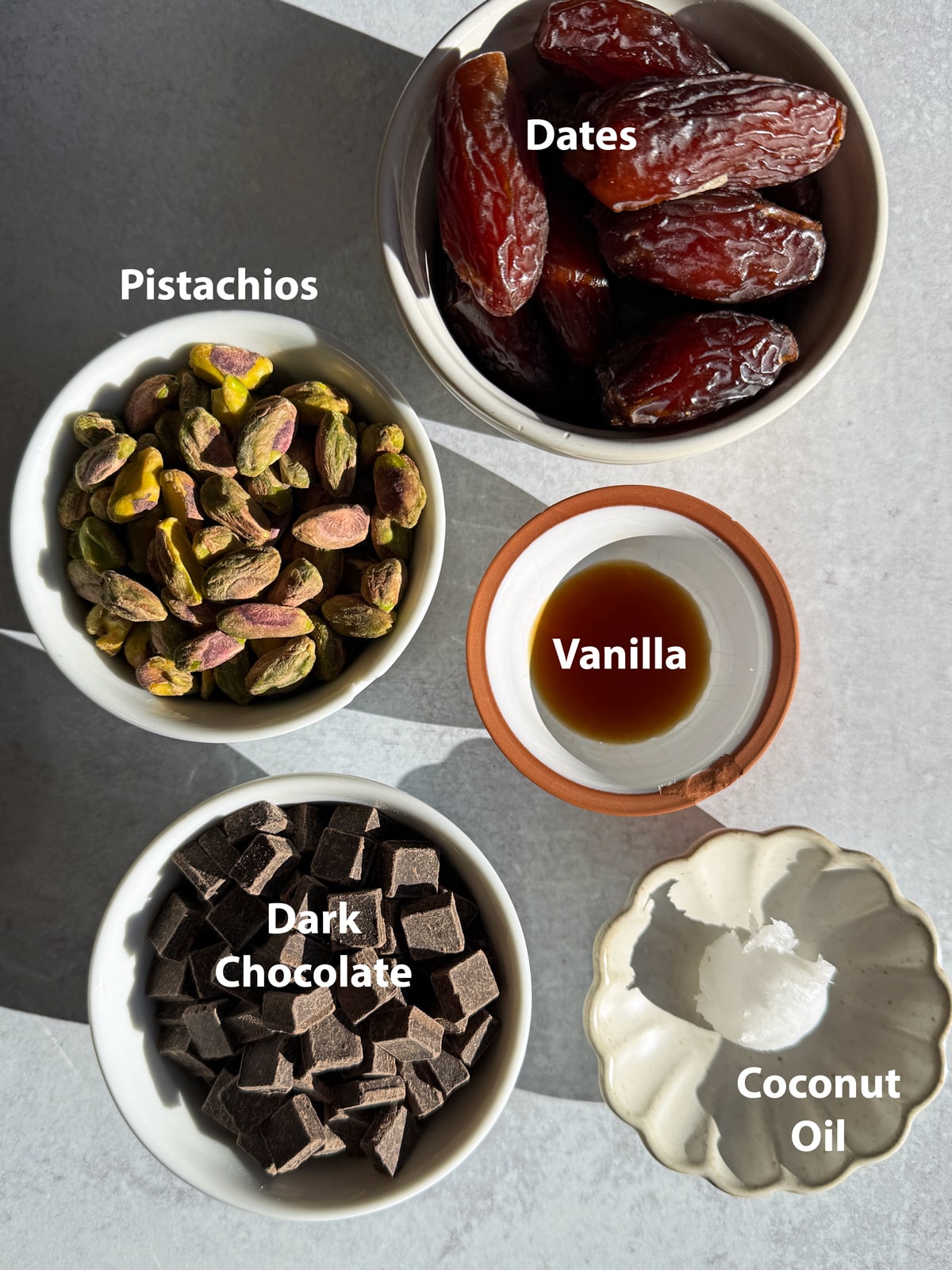 Ingredients needed to make pistachio date balls.