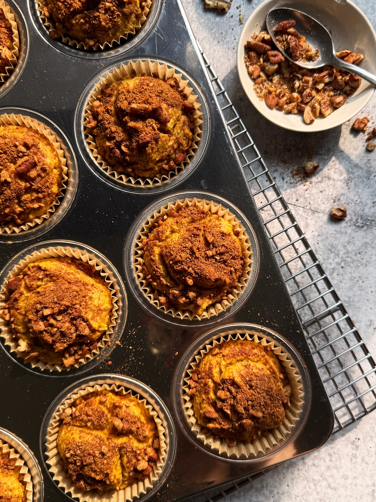 Freshly baked muffins in muffin tin.