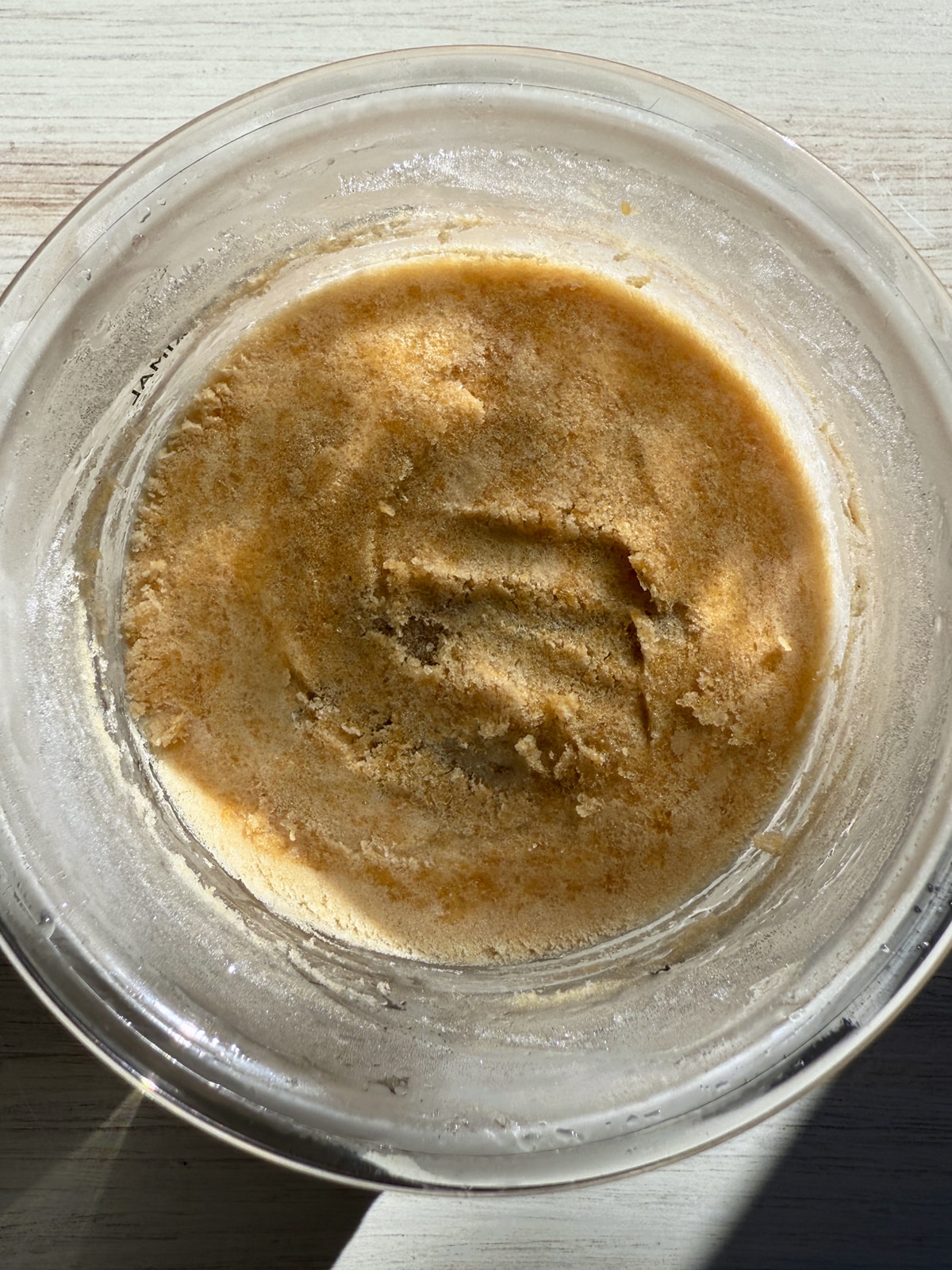 Frozen creami pint with top scaped level.