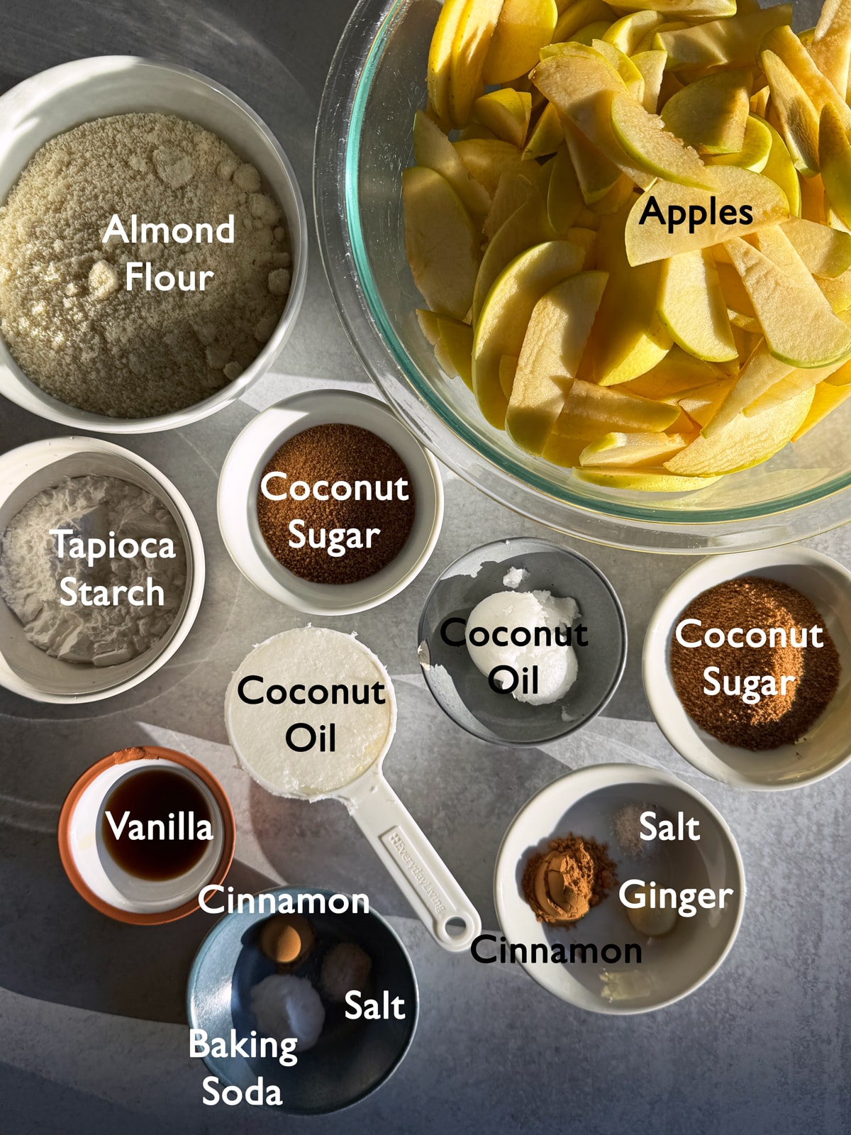 Ingredients needed to make a paleo apple cobbler.